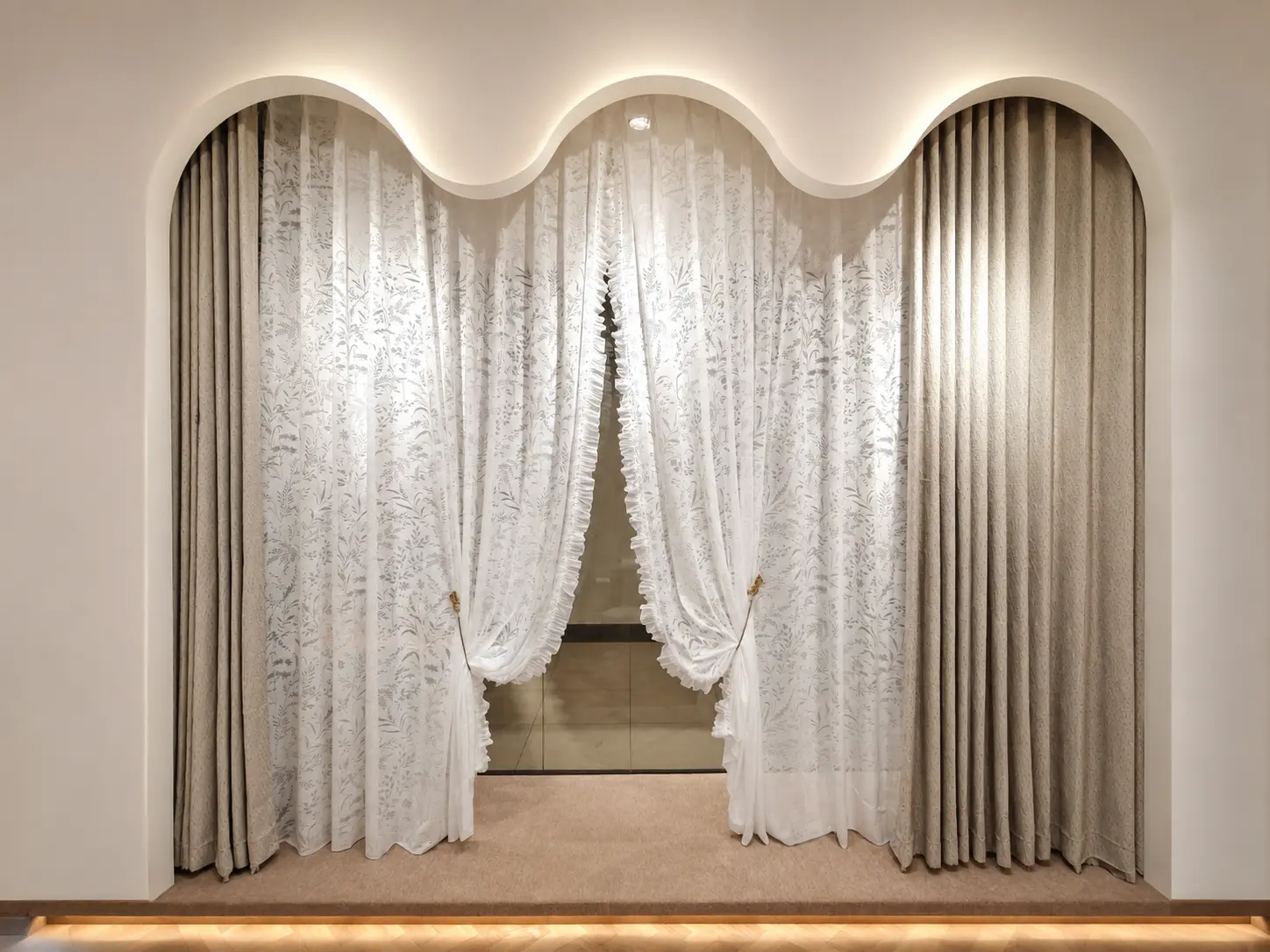 Sheer and decorative curtains in an arched display