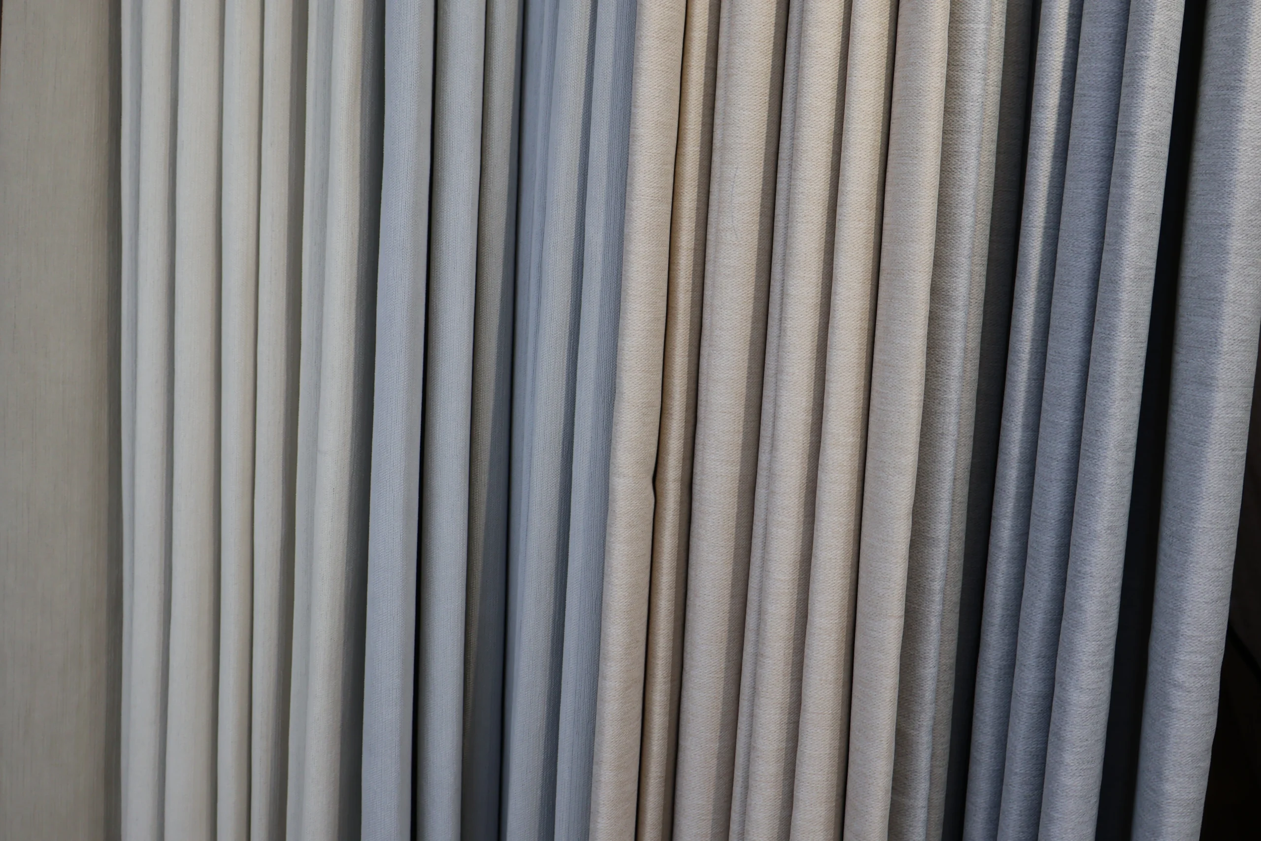 Curtain sample display with pale and dark shades